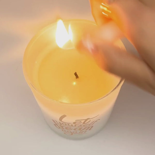 A video of the "Let yourself dream again" candle burning to reveal the message inside.