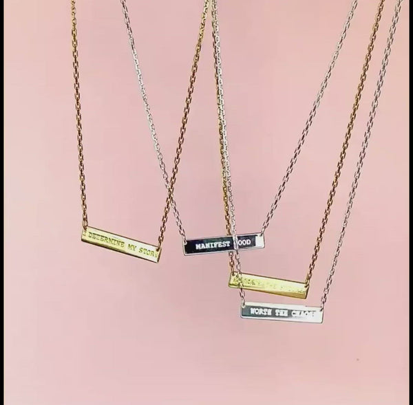 Video shows 4 minimalist bar pendants dangling together.