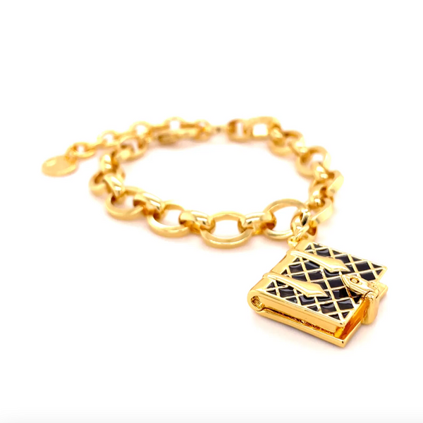 A video showing a 360-degree view of our black and gold book bracelet.